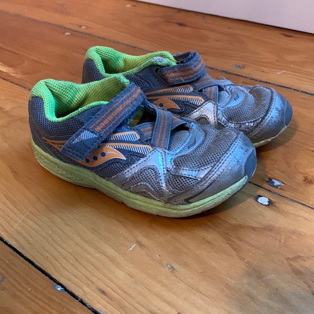 Toddler Saucony sneakers. Elastic and Velcro tie. Size 10.5K